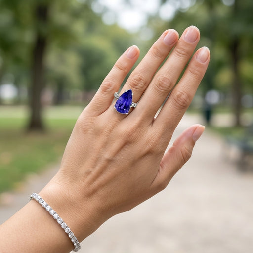 Tanzanite 11.10ct tw Ring with 0.52ct tw Diamonds in 14kt Gold