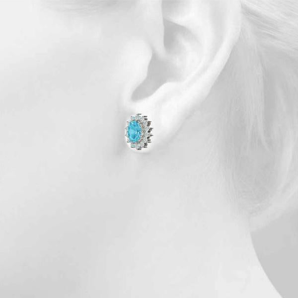 Blue Topaz 1.00ct & Diamond 0.67ct Earrings - 14kt Gold